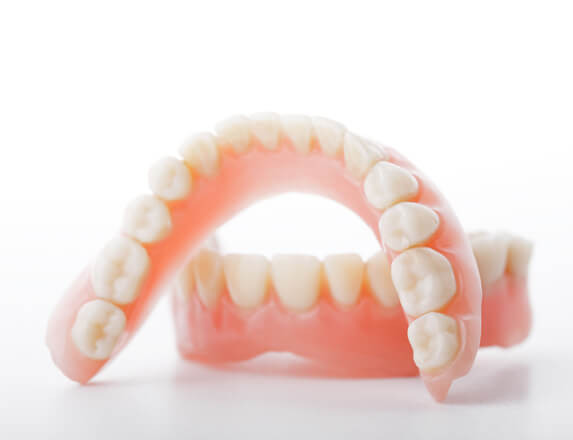 what are dentures partials